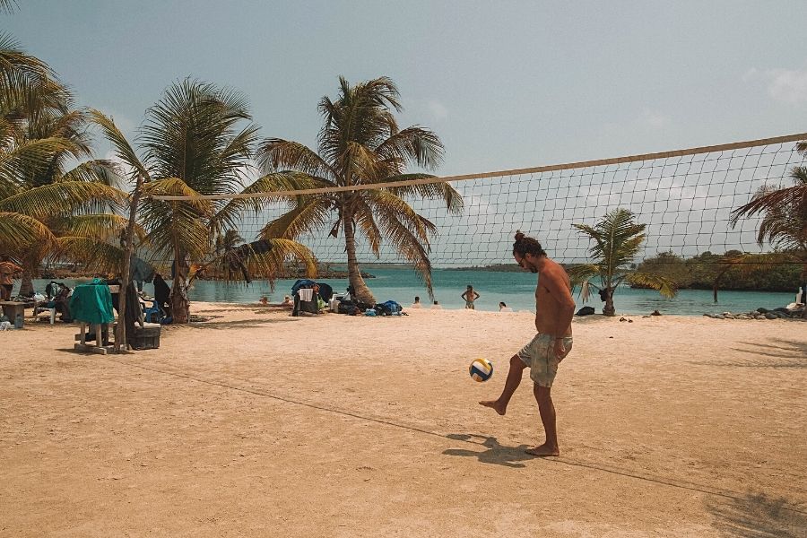 Foot volleyball is a version of beach volleyball, where two teams of 2 people compete