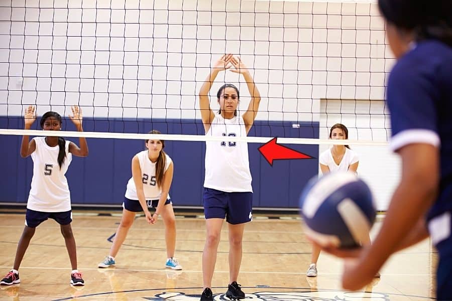 The middle hitter in a volleyball match needs to be tall because he or she will be responsible for blocking opponents' shots